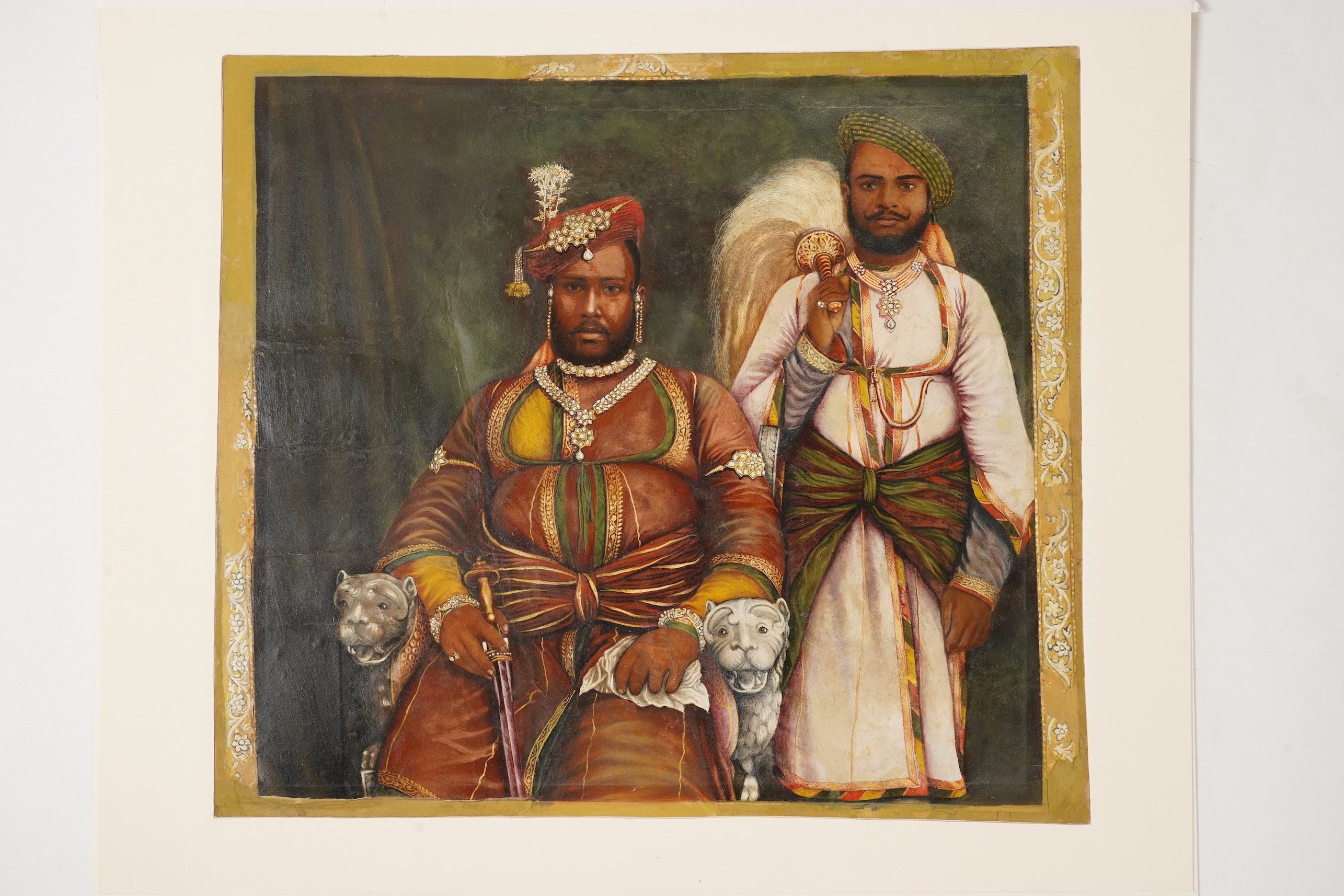 A hand painted albumen photograph of an Indian Maharajah with his attendant, late 19th century